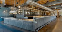 Cork & Cleaver Steakhouse, part of Happy Fork Hospitality Group, is opening a new location at Markley Station in Greenville’s West End dining district. (Photo/Colliers)