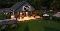 Macie & Milo’s Brew Pup features indoor outdoor space and dedicated dog parks designed for community gatherings. (Rendering/Cohn Construction)