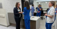 Staffers gather for a blessing of the expanded medical/surgical unit on the 10th floor of Bon Secours St. Francis in Greenville. (Photo/Bon Secours St. Francis)
