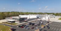 The 250,000-square-foot facility in Spartanburg is the largest of the four sites for Milo’s Tea Co. (Photo/Walmart)|The dedication drew a large crowd, with special guests and speakers including the South Carolina governor and CEO of Walmart U.S. (Photo/Milo’s Tea Co.)