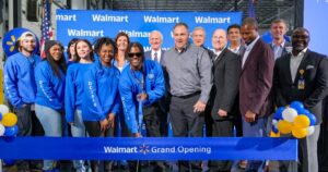 Walmart associates cut the ribbon to open the  new 725,000-square-foot perishable distribution center that will supply 180 stores and create 600 jobs. (Photo/Walmart U.S.)