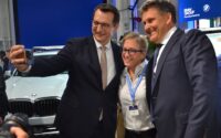 A BMW Manufacturing associate grabs an opportunity for a selfie with Milan Nedeljkovic, member of the board of management of BMW AG, and Robert Engelhorn, president and CEO of BMW Manufacturing. (Photo/Ross Norton)