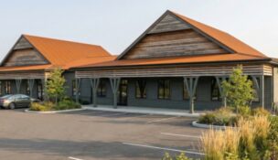 South Island Market on Johns Island is designed to reflect the island’s character, incorporating walkable spaces, preserved open land and a mix of commercial and residential uses. (Rendering/Pickney Partners)
